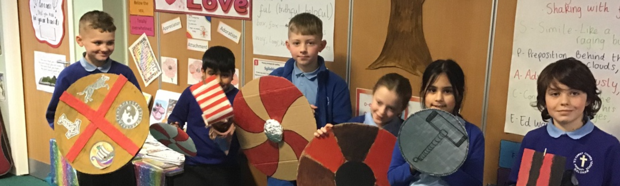 Year 5 children with Roman Shields